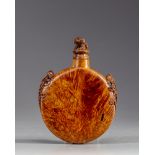 A Chinese wooden moon flask