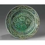 A large Islamic pottery stem bowl
