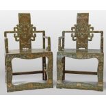 A pair of Chinese polychrome lacquered and gilt and arm chairs