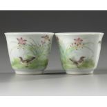 A pair of Chinese famille rose 'bird and lily' cups