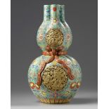 A Chinese famille rose triple gourd vase