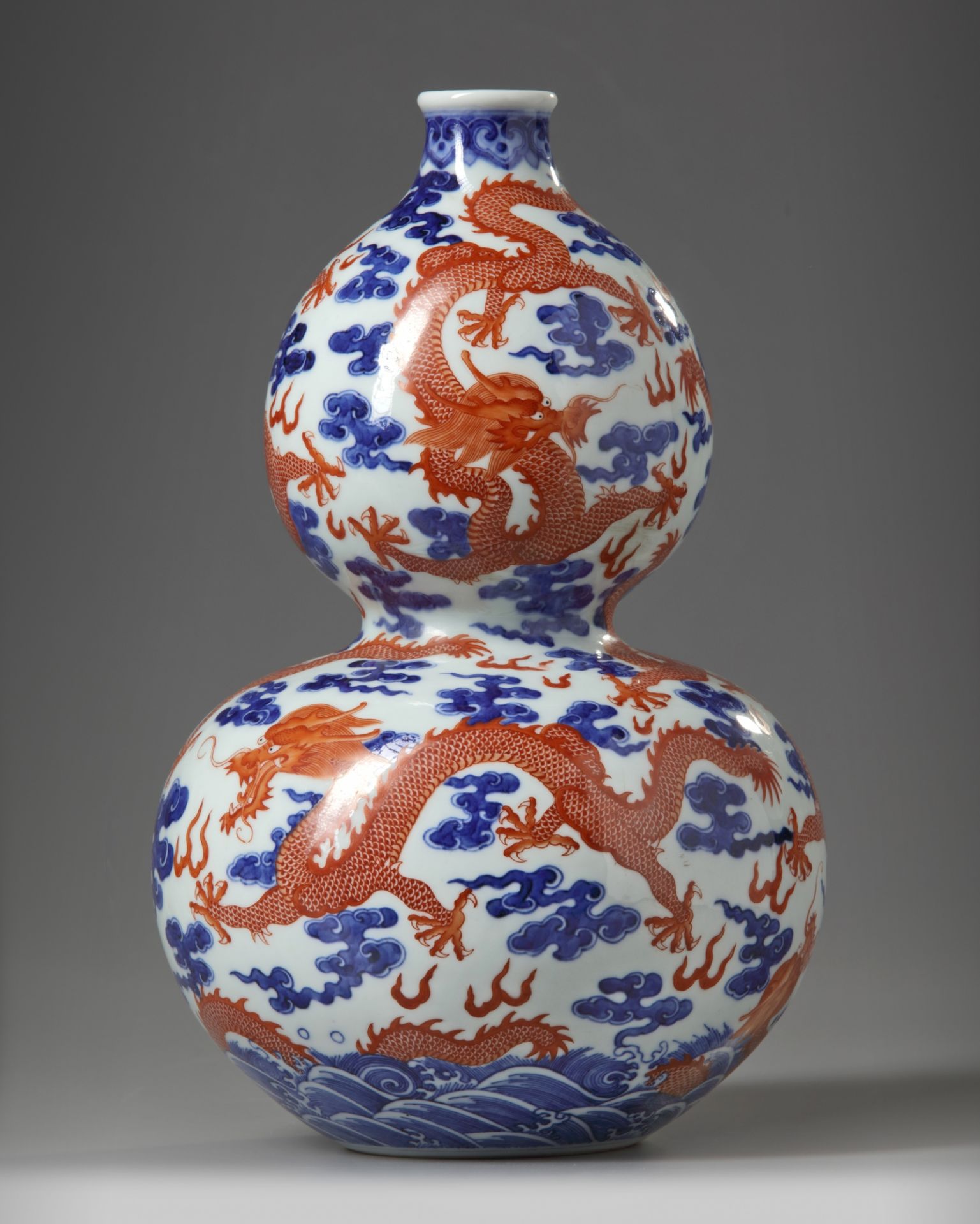 A Chinese iron-red-decorated blue and white 'dragon' double gourd vase - Image 3 of 5