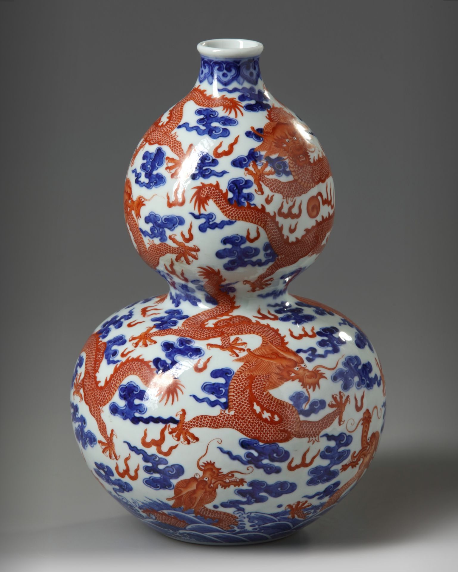 A Chinese iron-red-decorated blue and white 'dragon' double gourd vase - Image 2 of 5