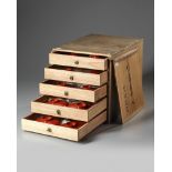 A thirty-piece red lacquered sake set