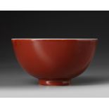 A Chinese coral-red-ground blue and white bowl