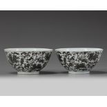 A pair of Chinese grisaille-decorated 'lotus' bowls