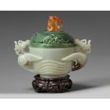 A Chinese pale celadon 'phoenix' censer and a spinach green jade cover