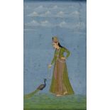 A Indian miniature depicting a lady and a peacock