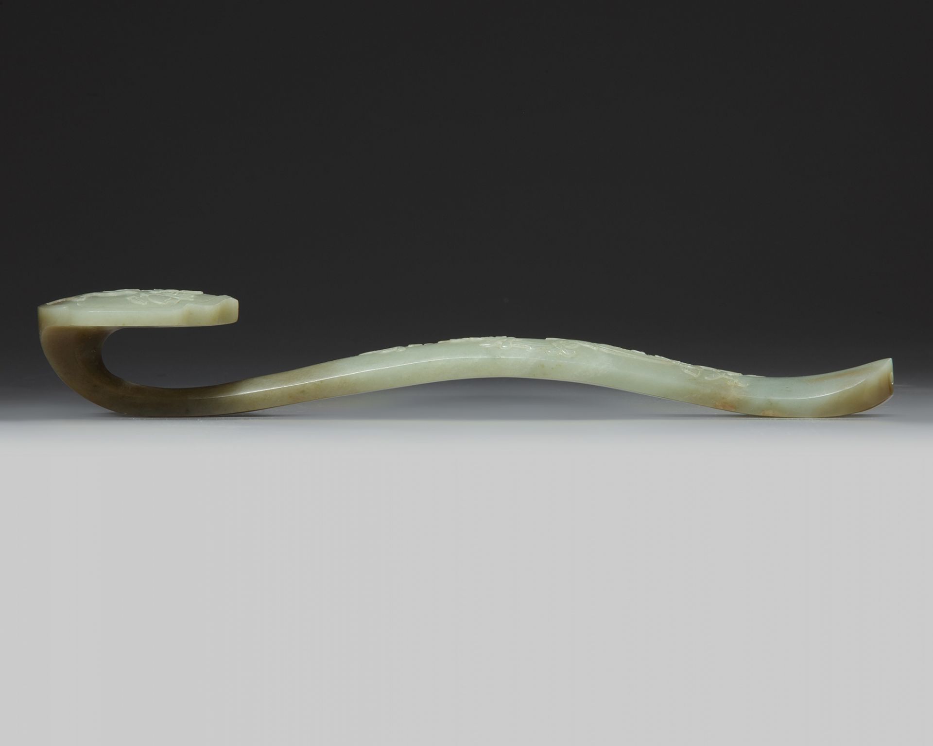 A Chinese celadon jade ruyi sceptre - Image 2 of 3