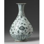 A Chinese blue and white 'scrolling peony' pear-shaped vase