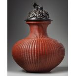A large Chinese coral-red-glazed 'fish basket' vase