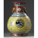 A large Chinese famille rose 'floral' revolving vase