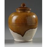 A Chinese amber-glazed jar and cover