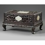 A Chinese white jade-inlaid carved box and cover