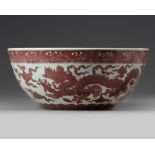 A Chinese underglaze copper-red-decorated 'dragon' bowl