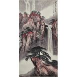 A Chinese hanging scroll of a mountain landscape