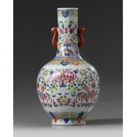 A Chinese famille rose 'bats and lotus' bottle vase