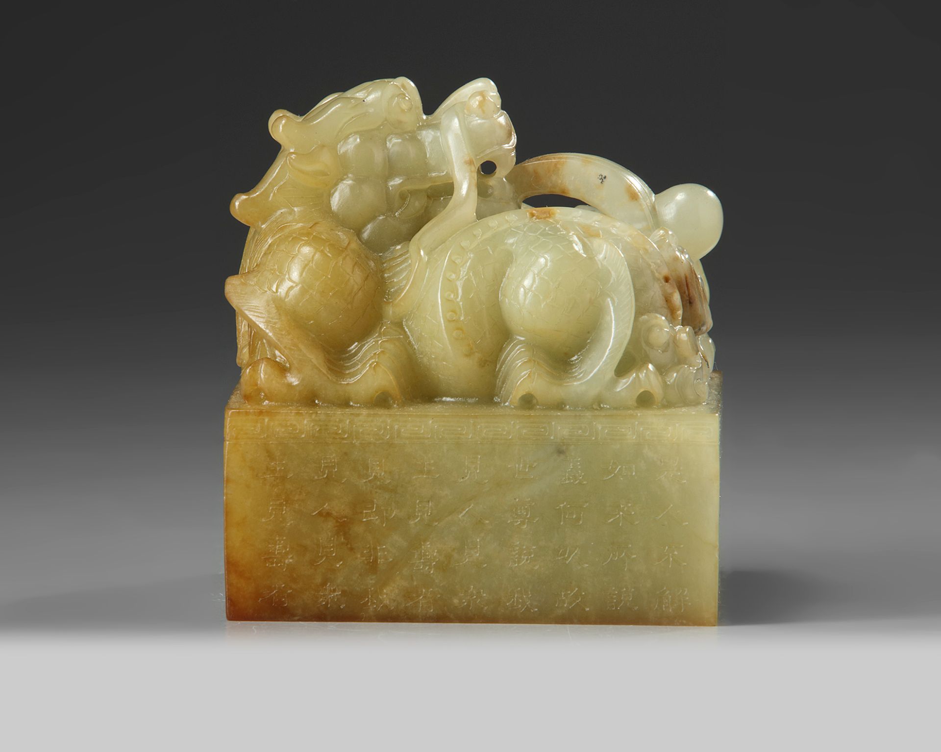 A large Chinese celadon jade 'dragon' seal