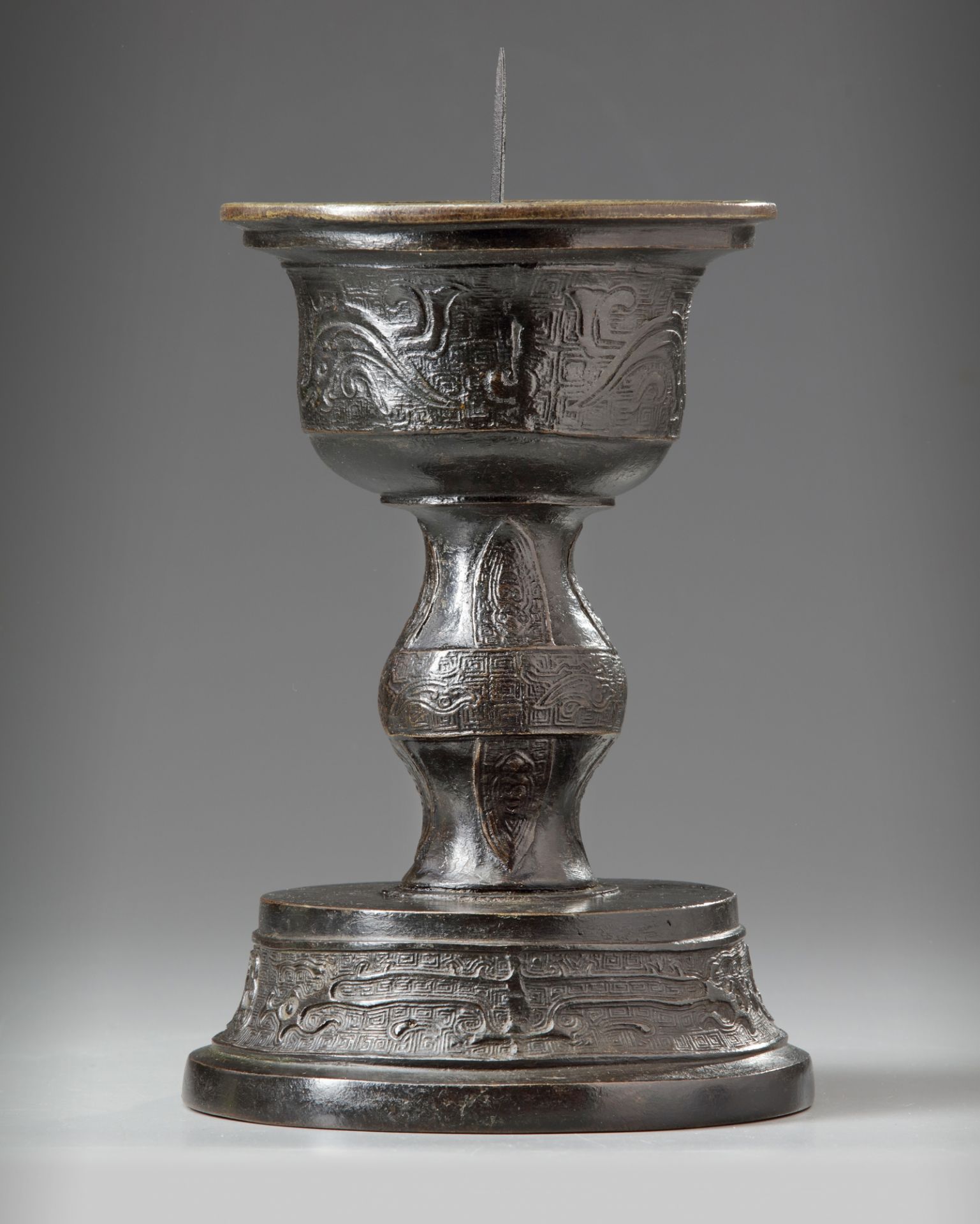 A Chinese bronze candle holder - Image 2 of 5