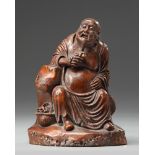 A Chinese bamboo carving of Budai