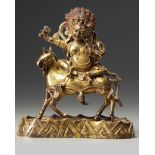 A Sino-Tibetan gilt bronze figure of Palden Lhamo