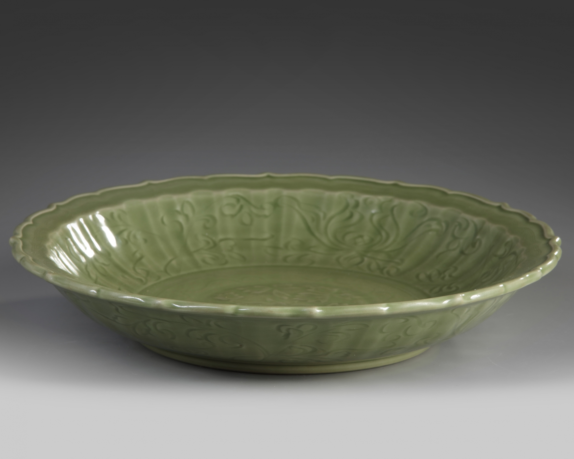 A Chinese Longquan-celadon-glazed 'lotus' barbed-rim charger - Image 2 of 3