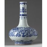 A Chinese blue and white 'bats and gourds' bottle vase