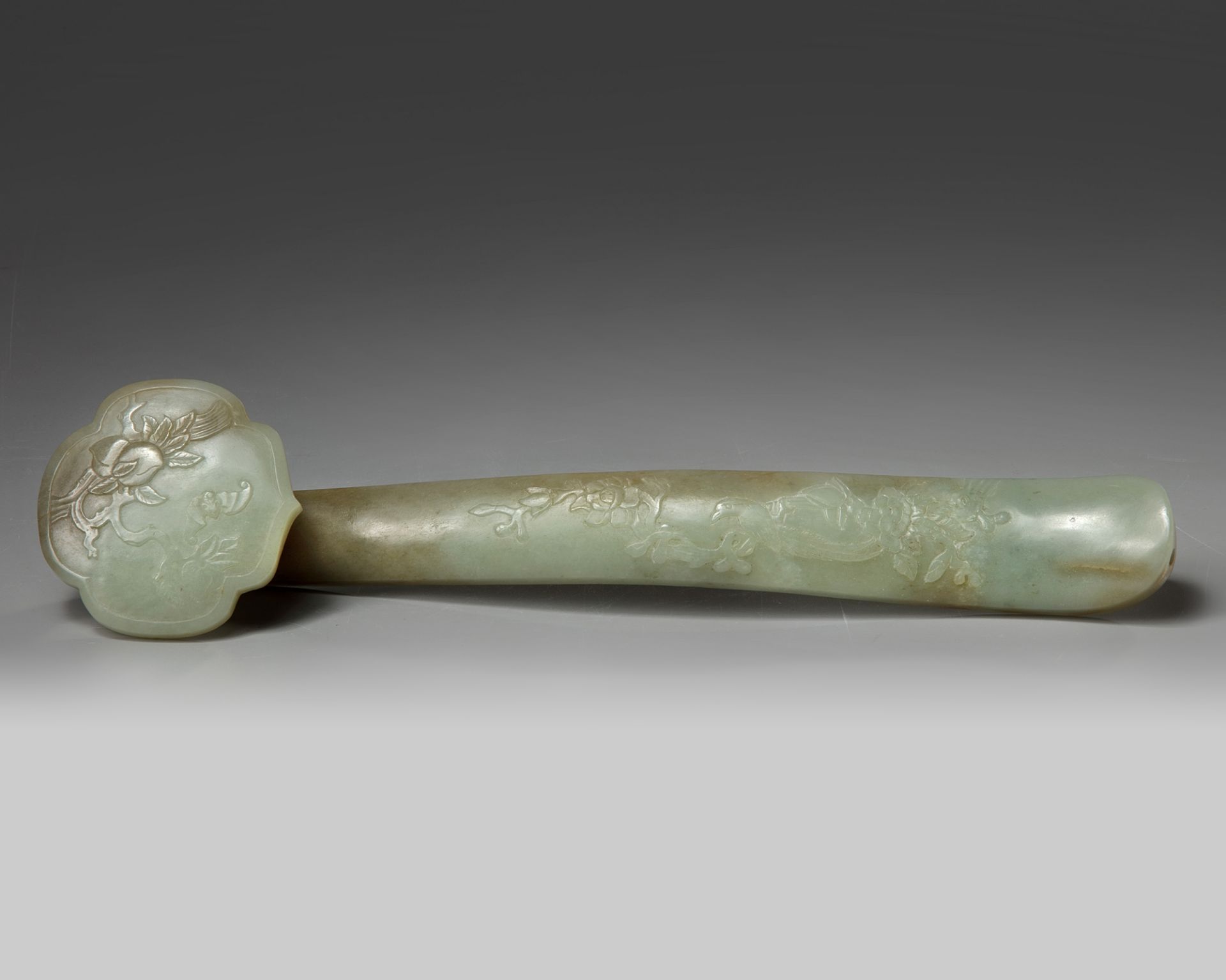 A Chinese celadon jade ruyi sceptre