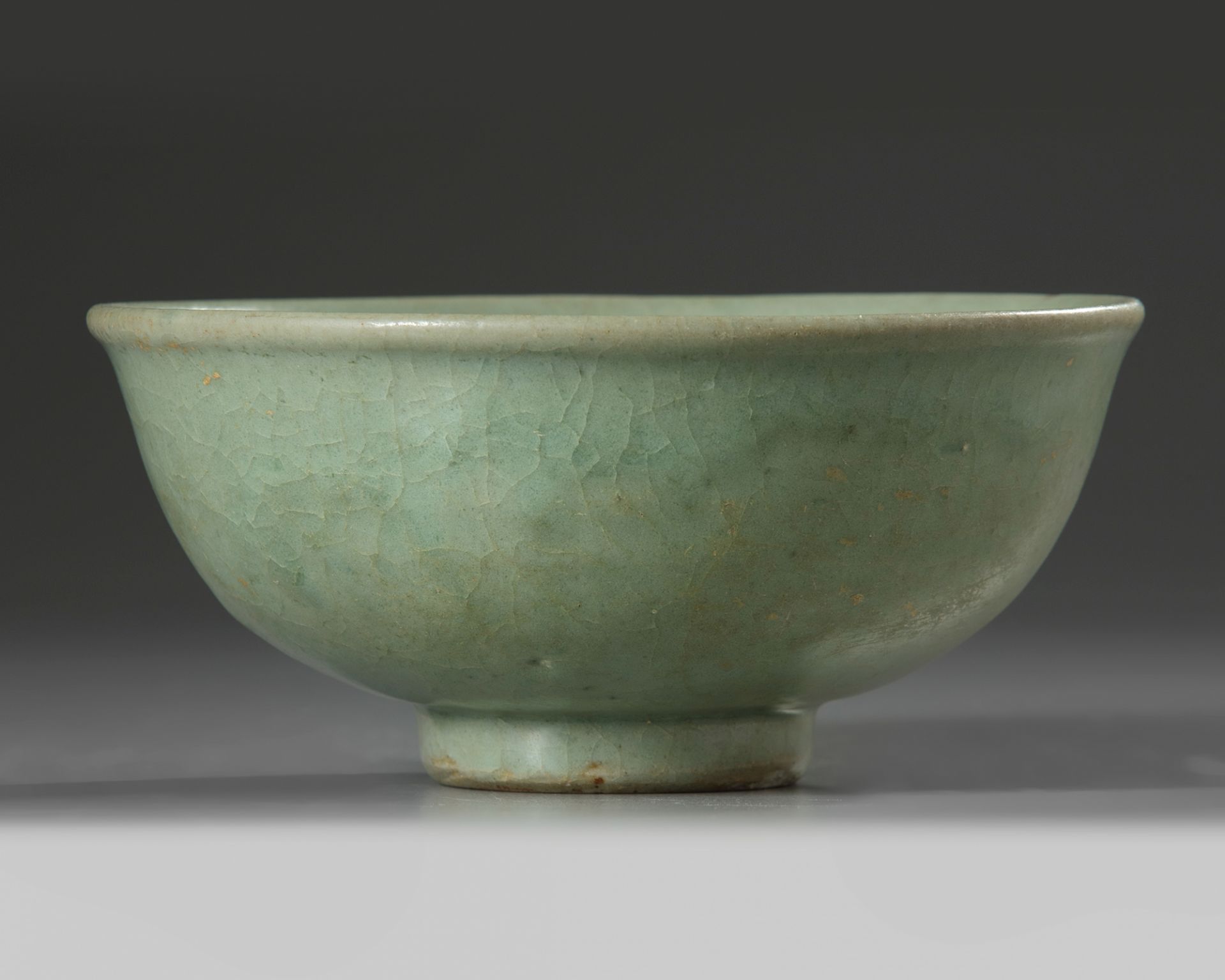 A Chinese Longquan celadon moulded ‘floral’ bowl - Image 5 of 5