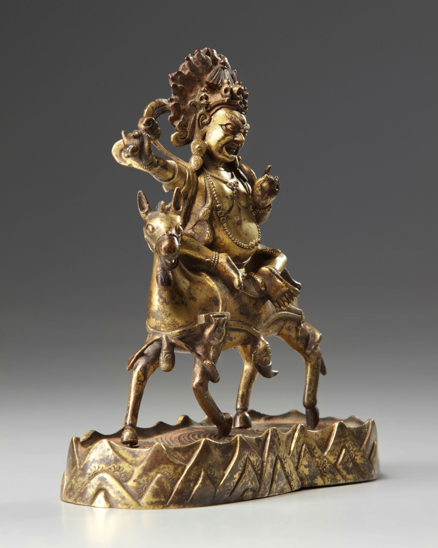 A Sino-Tibetan gilt bronze figure of Palden Lhamo - Image 3 of 5