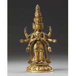 A Sino-Tibetan gilt bronze multi-headed Avalokitesvara