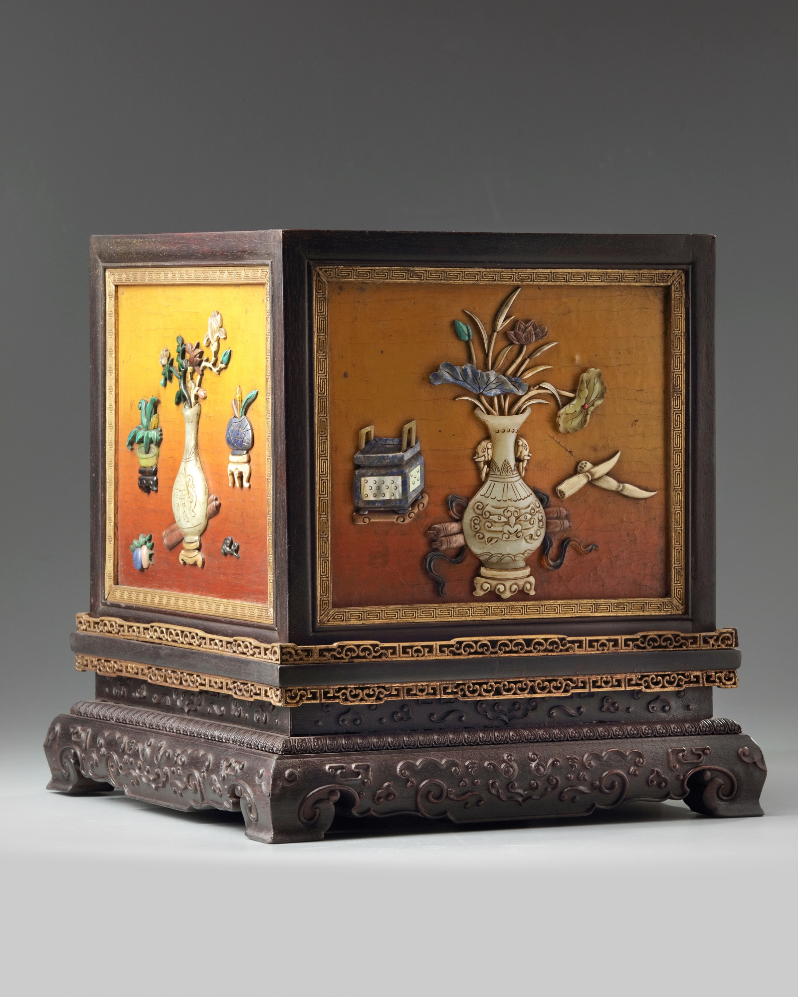 A Chinese hongmu display cabinet and hardstone-inlaid lacquer cover