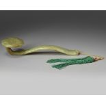 A Chinese celadon jade ruyi sceptre