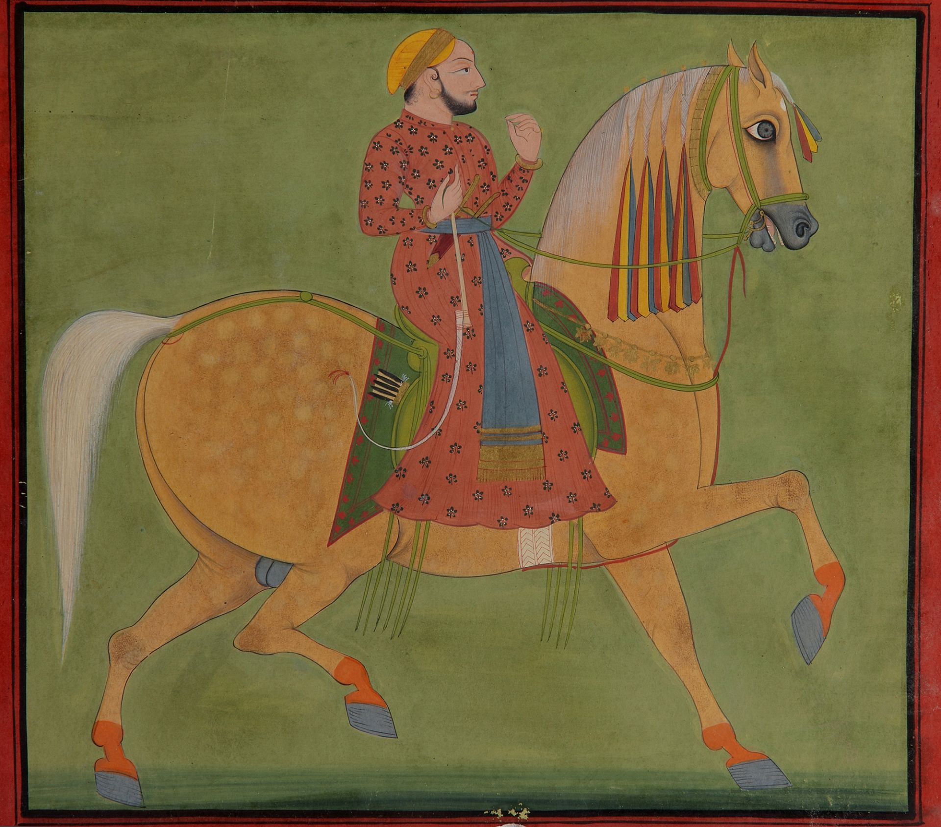 A Indian miniature depicting a man on a horse