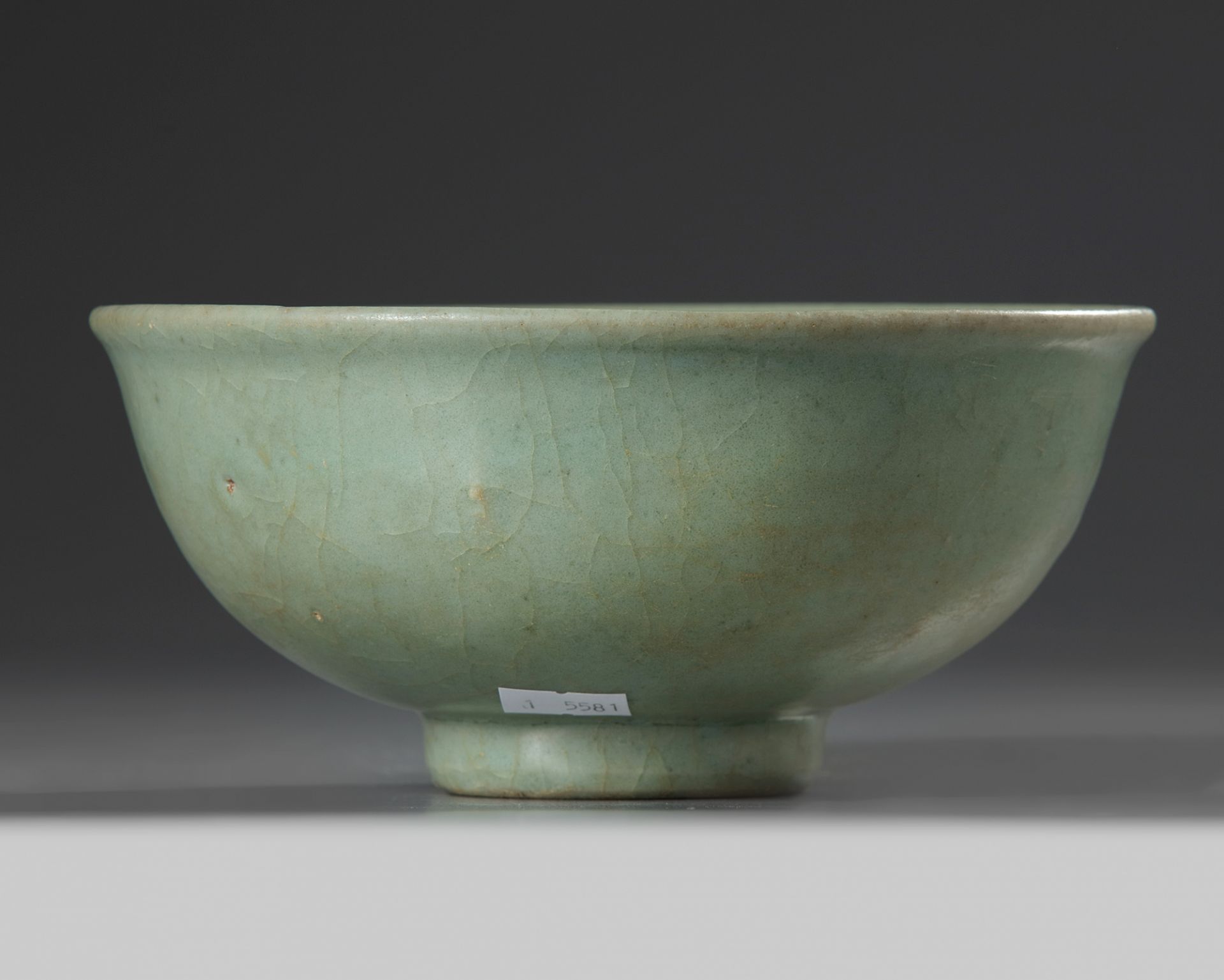 A Chinese Longquan celadon moulded ‘floral’ bowl - Image 4 of 5