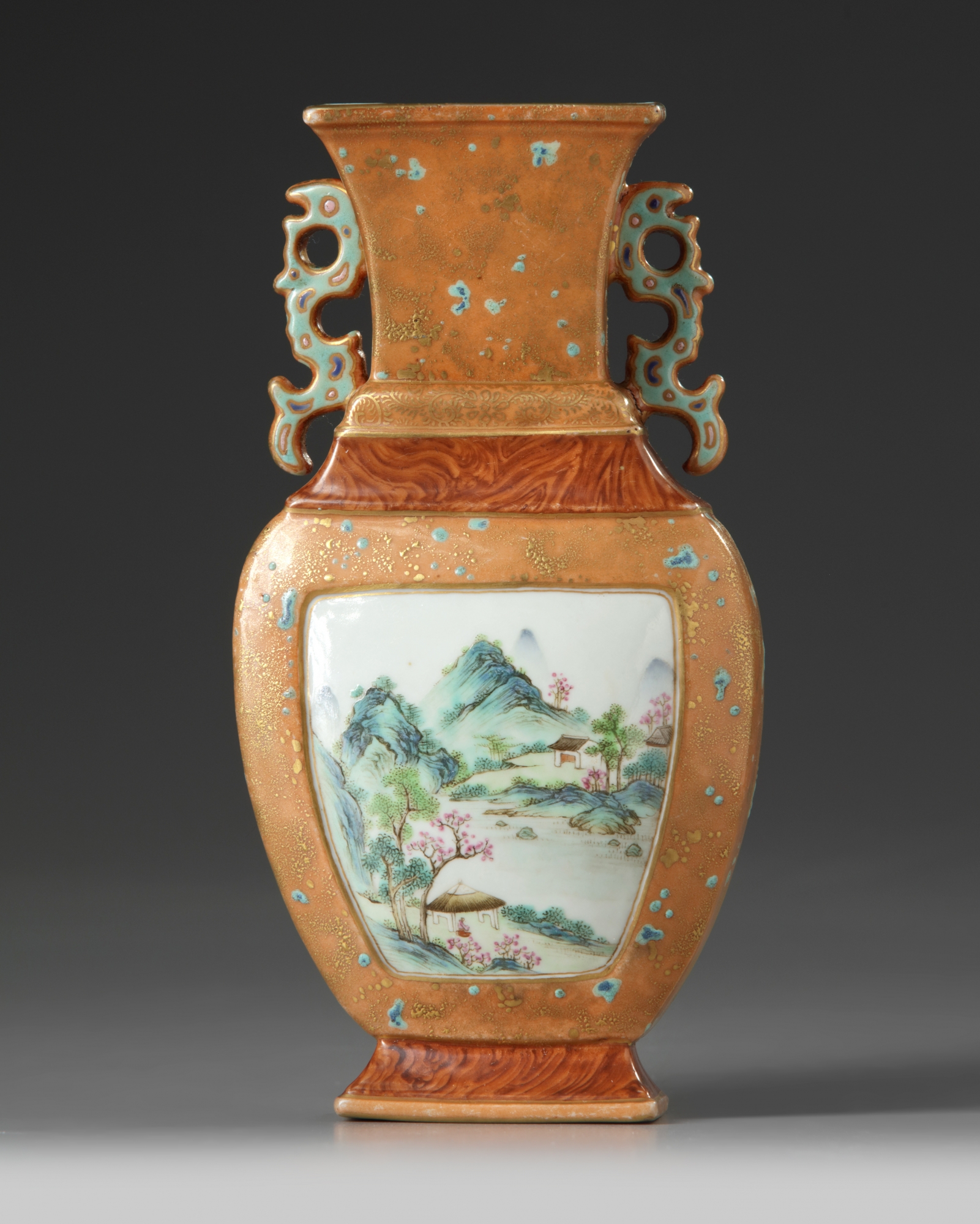 A Chinese faux-bronze and faux bois famille rose wall vase