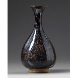 A Chinese black glazed rust-splashed pear-shaped vase