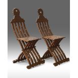 Two Syrian wooden folding chairs inlaid with mother of pearl