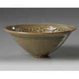 A Yaozhou celadon-glazed ‘chrysanthemum scroll’ bowl