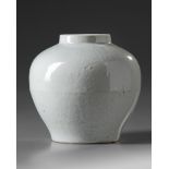 A Chinese white glazed 'dragon' jar