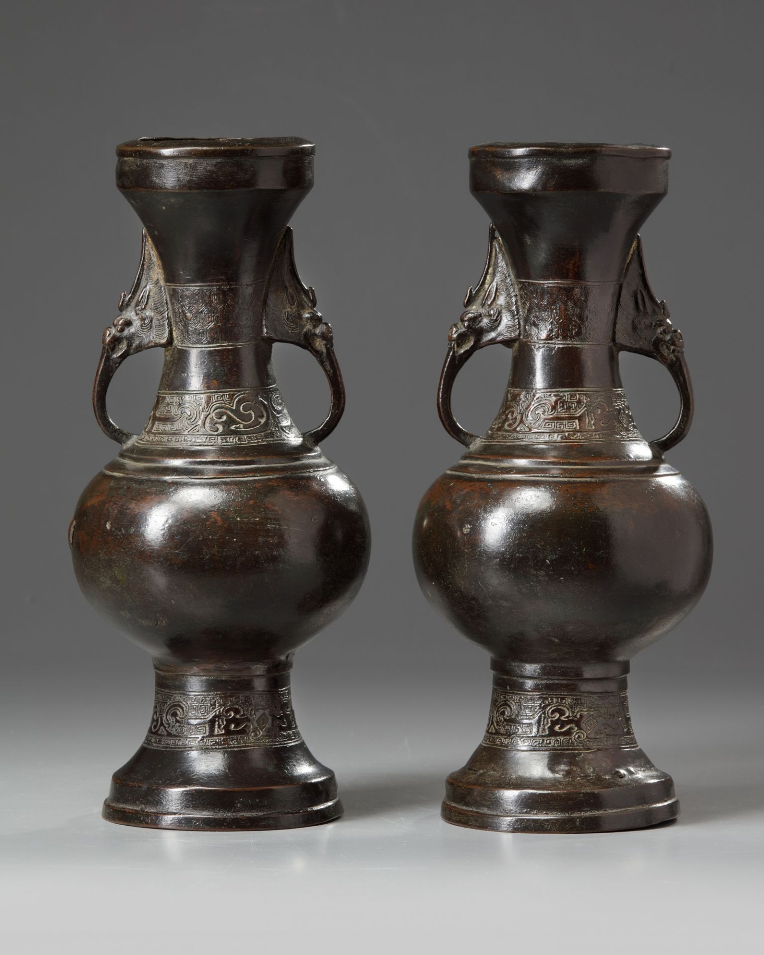 A pair of Chinese bronze vases