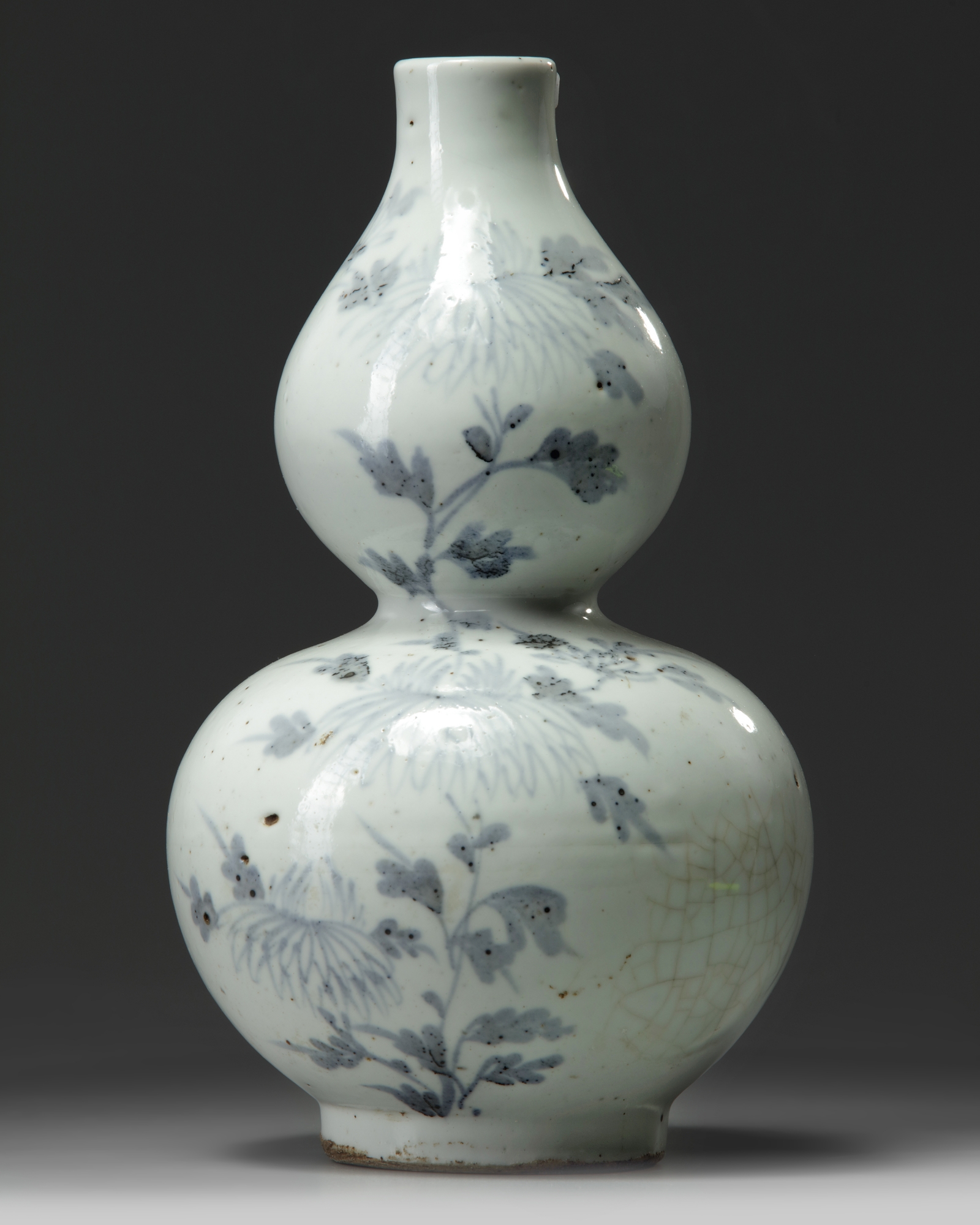 A Korean blue and white 'butterfly and chrysanthemum' double gourd vase