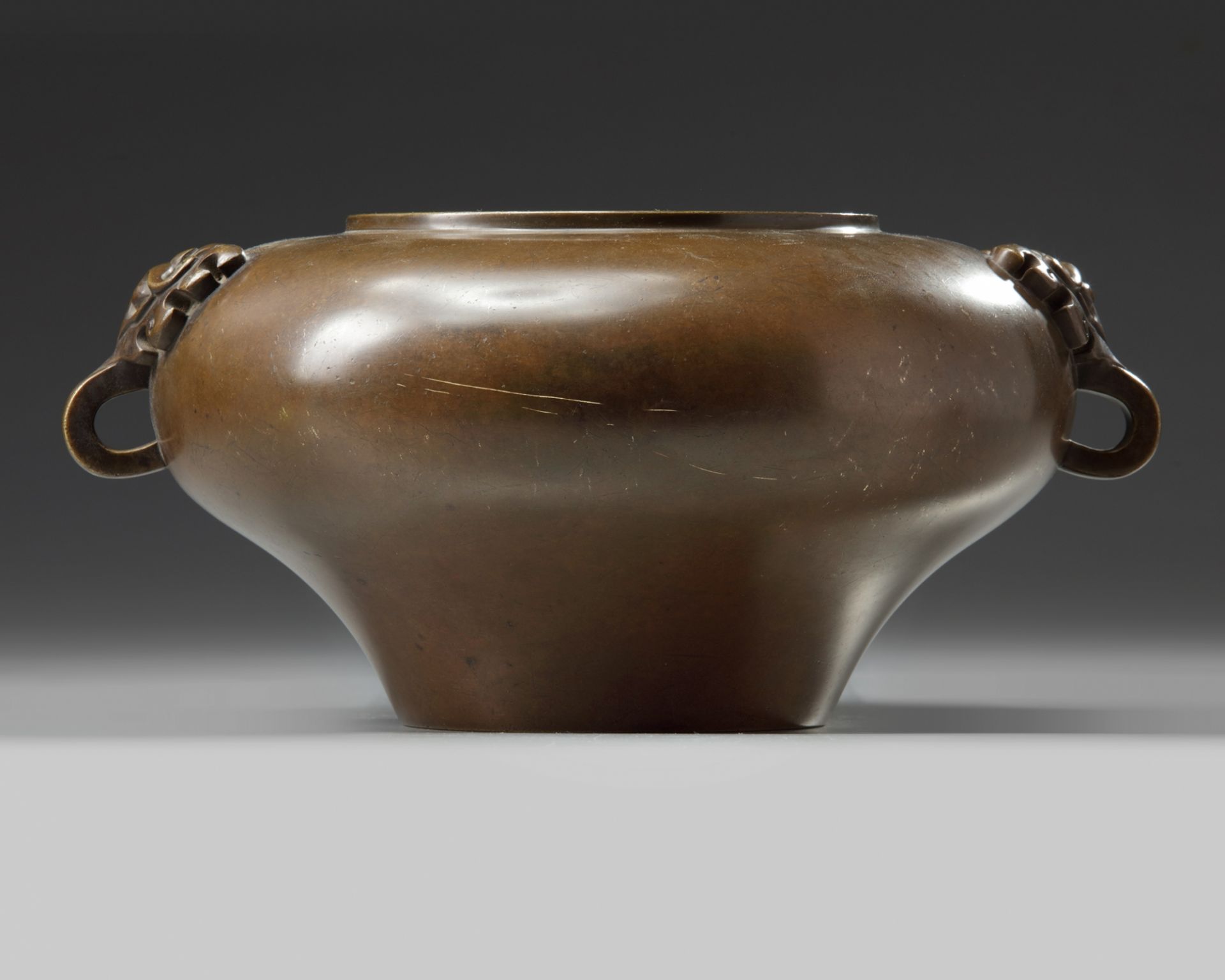 A Chinese bronze 'taotie' censer