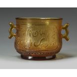 A Chinese gold-flaked amber glass censer for the Islamic market