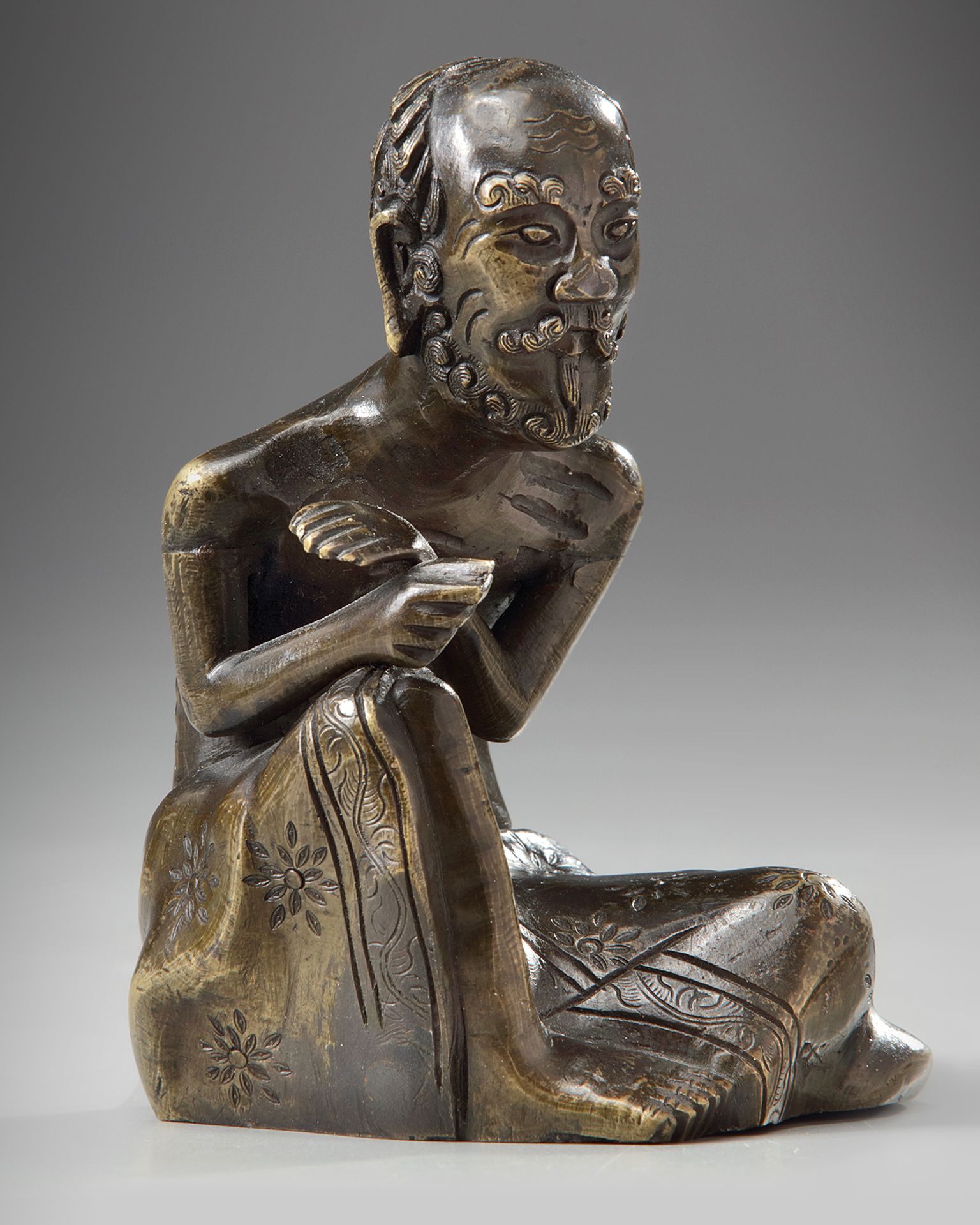 A Chinese bronze figure of the ascetic Shakyamuni