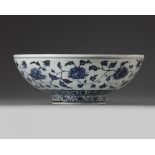 A Chinese blue and white 'peony scroll' bowl