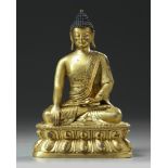 A Chinese gilt bronze figure of Shakyamuni