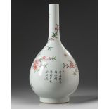 A Chinese famille rose 'prunus' bottle vase