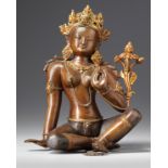 A Nepalese parcel gilt bronze figure of a bodhisattva