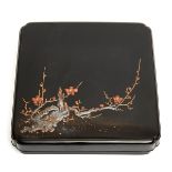 A Japanese square black lacquerwork box decorated with a blossom branch (kobai)